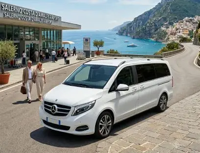 Luxury Mercedes V-Class minivan transfer at Salerno Costa d'Amalfi Airport with Positano coastline background
