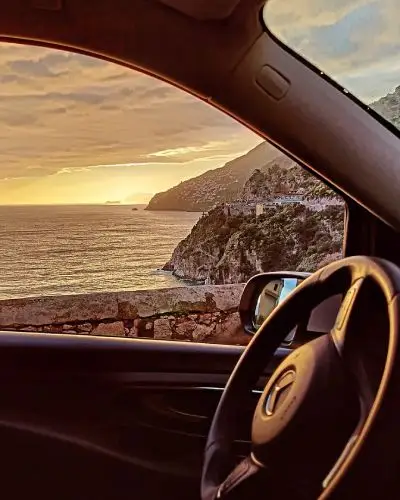 Premium Mercedes van chauffeur service in Maiori during a sunset tour